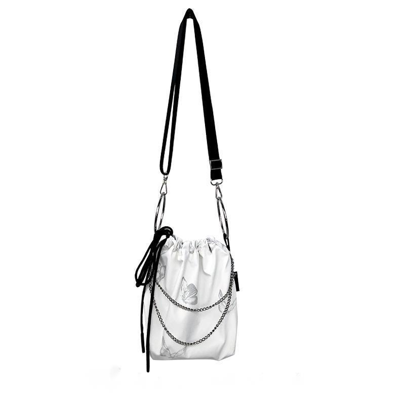 Borsa a farfalla riflettente scura bianca da donna nuova borsa a catena a maglie incrociate borsa Versatile con coulisse borsa a tracolla leggera da donna