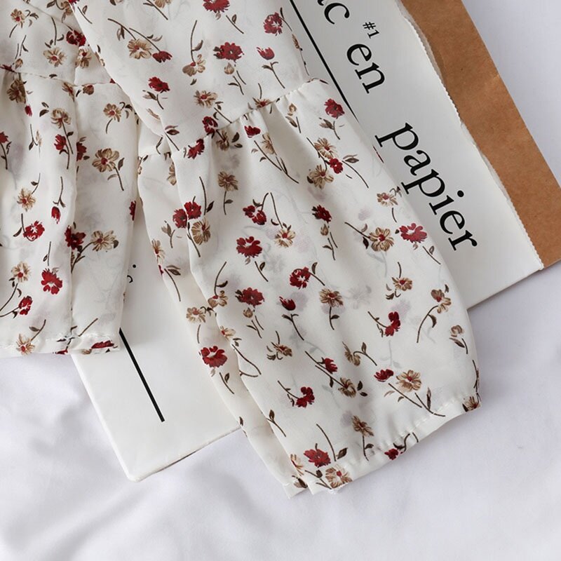 Damski dekolt w serek modne kwiatowe wzory szyfonowe bluzki słodki mały świeży długi rękaw bluzki z szyfonu