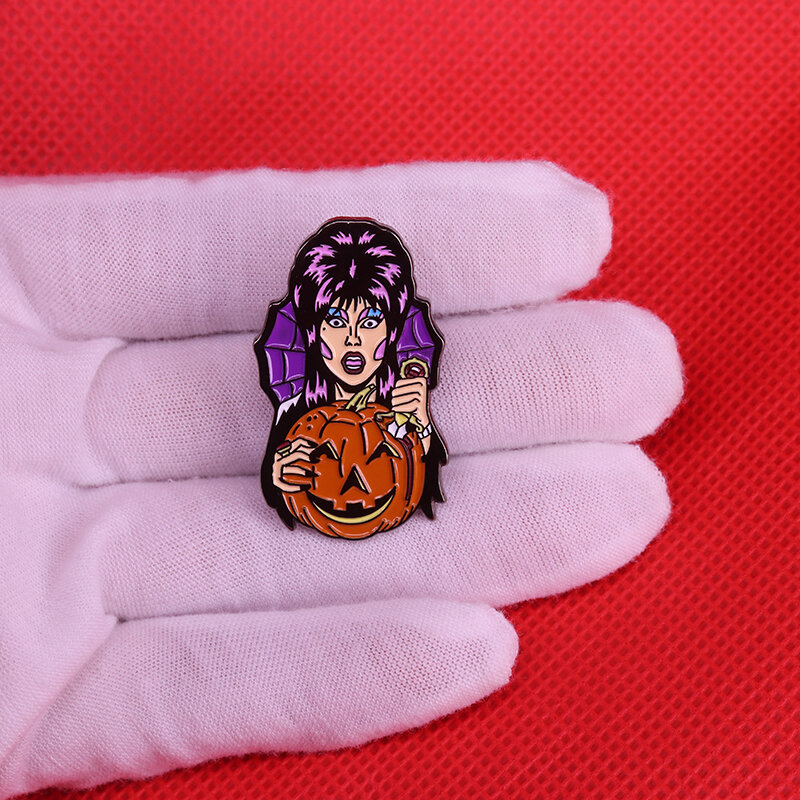 Elvira the Queen of Darkness Hand Carved on a Pumpkin badge Holiday Icons accessory