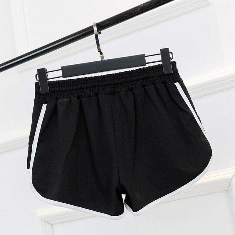 Pantalones cortos holgados de banda ancha elásticos de color sólido de verano para mujer