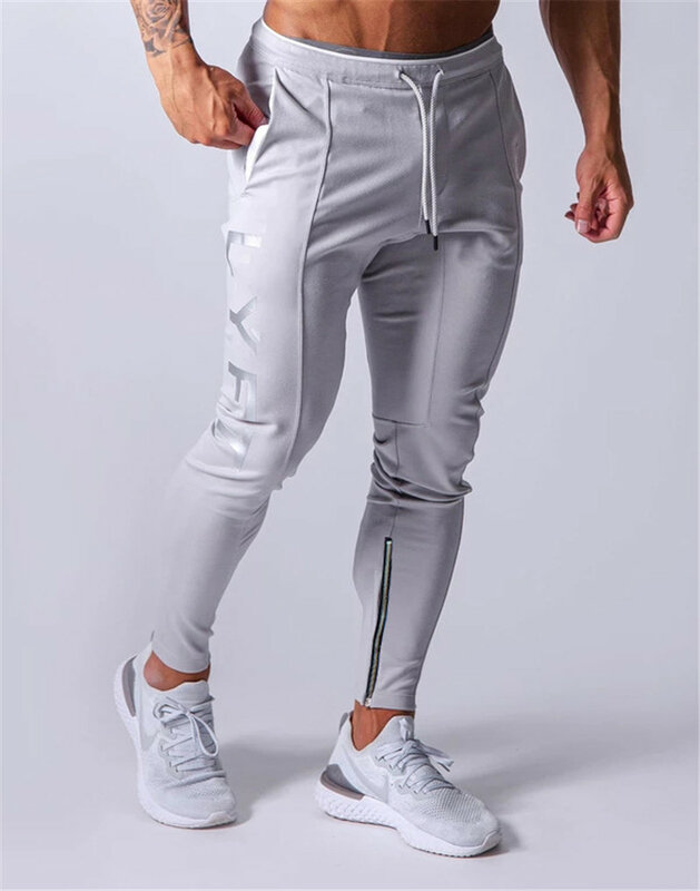 Calças esportivas dos homens jogger calças esportivas de fitness nova moda impressa do músculo calças de treinamento de fitness masculino