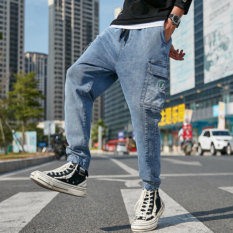 プラスサイズのジーンズの男性ストリートジョギング男性だぶだぶのジーンズマルチポケット冬デニム貨物パンツ