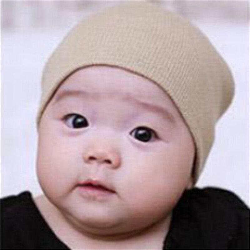 Nowonarodzone dziecko Unisex czapka typu Beanie miękka śliczna czapka bawełniana elastyczna zimowa ciepła solidna kolorowa czapka niemowlęca Toddle kapelusz na prezent