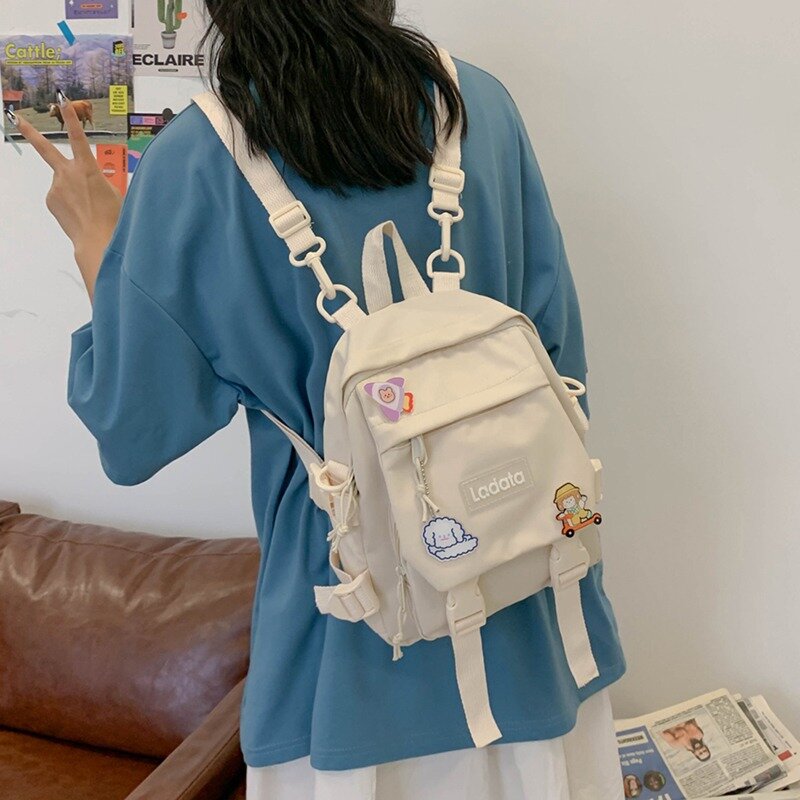 Mochila escolar feminina, bolsa pequena de nylon à prova d'água para escola e faculdade, multifuncional com emblema para meninas