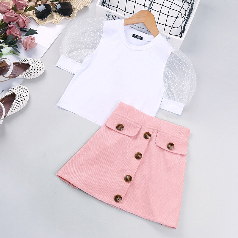 Blusa de manga larga de Color liso para niña, falda de cuero con bolsillo abierto y botones, dos piezas, grupos de niñas pequeñas