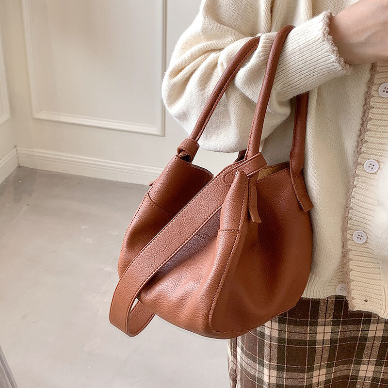 2021 nova moda senhoras de luxo de alta qualidade casual simples e versátil bolsa de ombro estilo ocidental simples saco de balde portátil