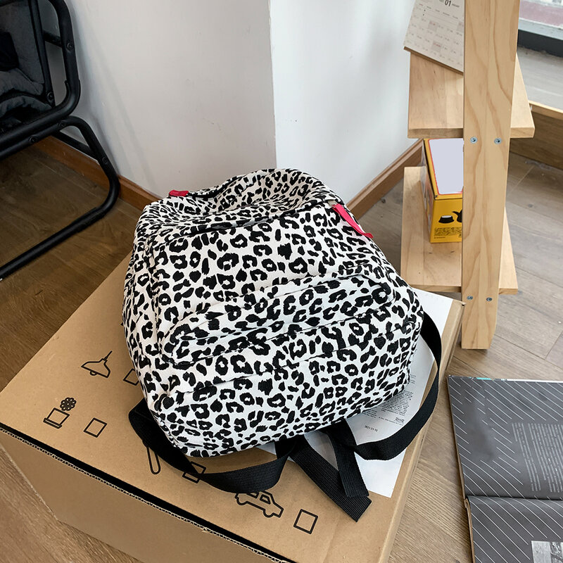 กระเป๋าเป้สะพายหลังผู้หญิงใหม่ Zebra วัวรูปแบบการพิมพ์ผ้าใบ Vintage Preppy สไตล์กระเป๋าเป้สะพายหลังนั...