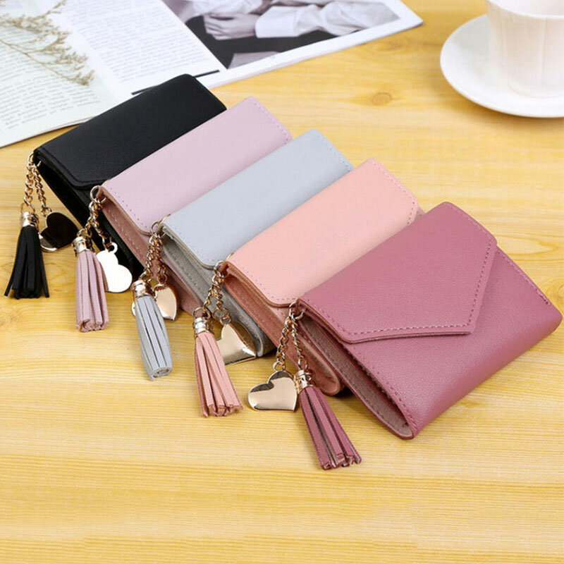 Nowe skórzane małe portfele damskie luksusowe marki Design Mini portfel torebki damskie krótkie monety Zipper etui na karty kredytowe