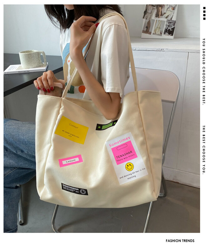 無地の女性用キャンバスバッグ,大容量,シンプル,ファッショナブル,非対称,芸術的なパターン,新しい2021