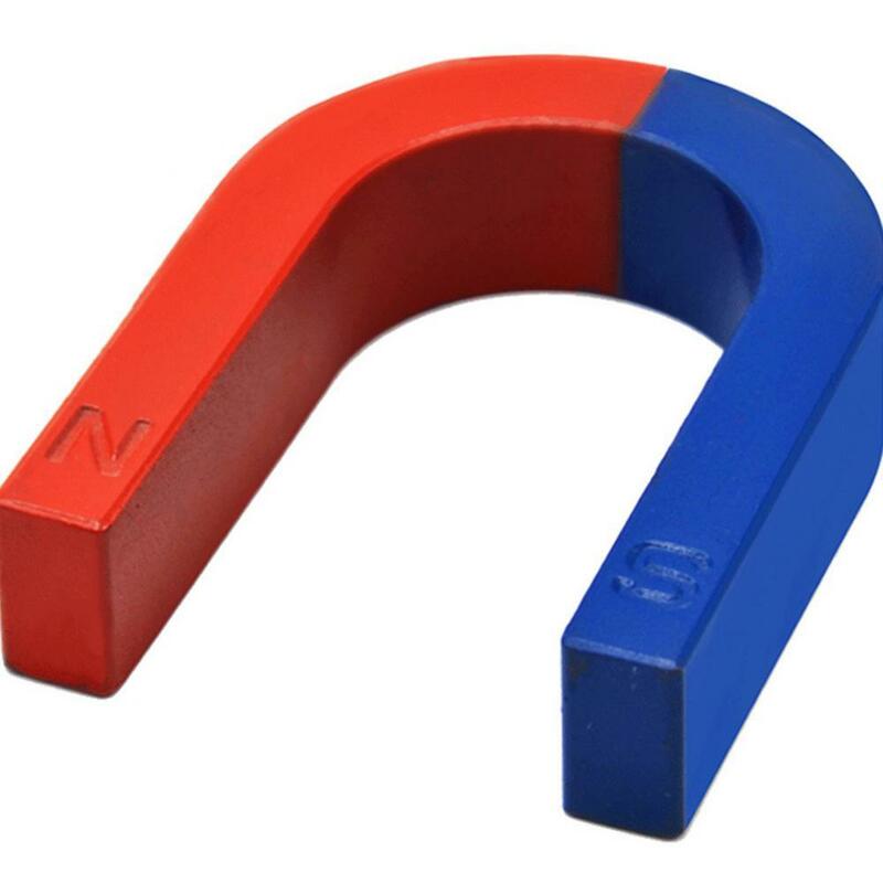 Eksperyment fizyczny Pole nauczanie czerwony niebieski malowany magnes podkowy w kształcie litery U.