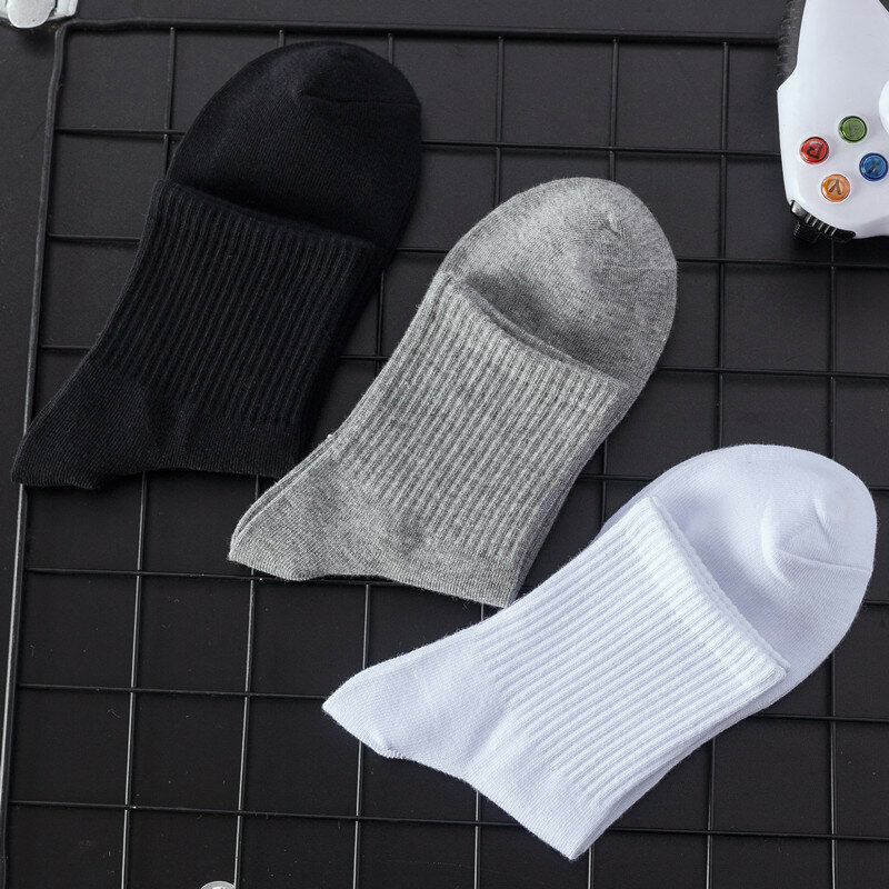 Calcetines de algodón suave y transpirable para hombre, medias de tubo medio de alta elasticidad, informales, Color sólido, blanco y negro