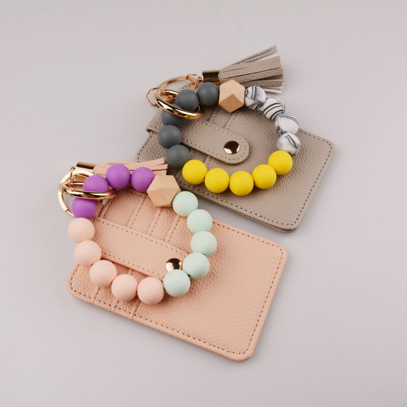 Bracelets à perles en Gel de silice pour hommes et femmes, porte-clés, sac de carte, tendance, cuir PU, pendentif pompon, nouvelle collection