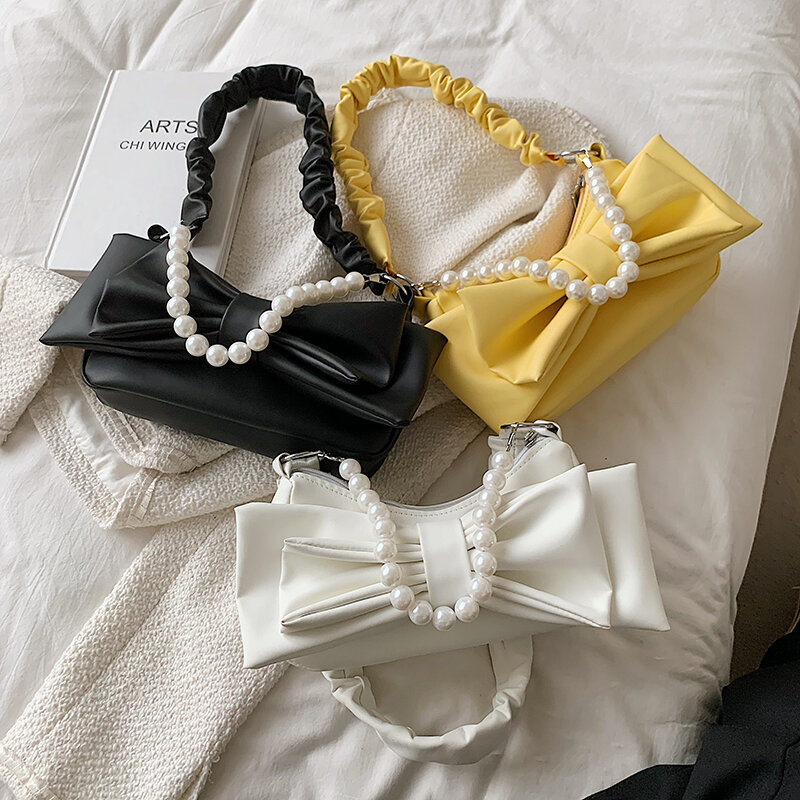 新しいシンプルなハンドバッグの女性のクロスボディバッグデザイナー真珠チェーン弓女性のショルダーバッグ嚢ソフトレザーメッセンジャーバッグ女性ボルサ