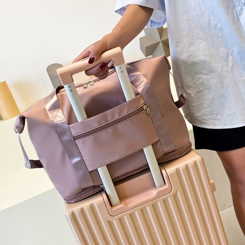2021 سعة كبيرة حقيبة سفر قابلة للطي WomanTravel حقائب سعة كبيرة اليد الأمتعة حمل مجموعة القماش الخشن لسيدة والرجال حقائب السفر