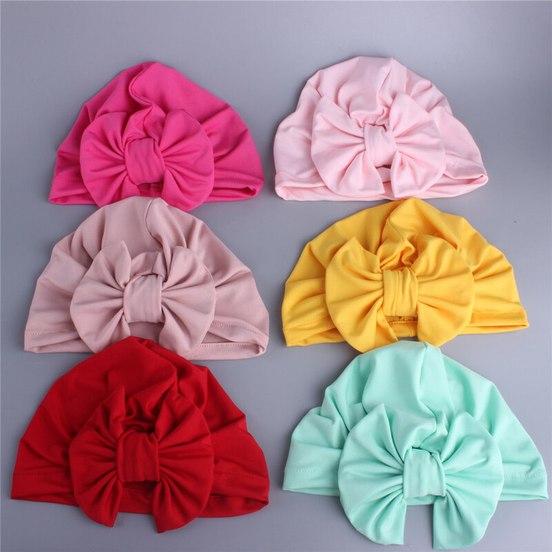 Bonnets Tuban doux en Fiber de lait pour nouveau-né, casquette solide avec nœud papillon pour garçons et filles, 9 couleurs, de 0 à 12 mois