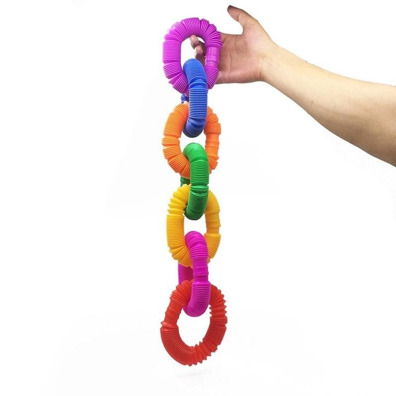 Giocattoli magici creativi creativi del cerchio dei giocattoli della bobina del tubo di plastica divertente giocattoli pieghevoli educativi di sviluppo precoce