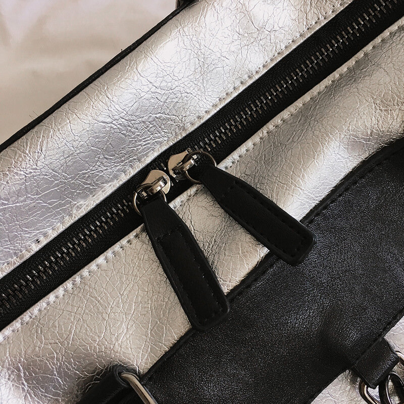قصيرة المسافة حقيبة سفر السيدات حقائب اليد الأمتعة الرجال النسخة الكورية من لينة بولي Leather الجلود سعة كبيرة مقاوم للماء اللياقة البدنية