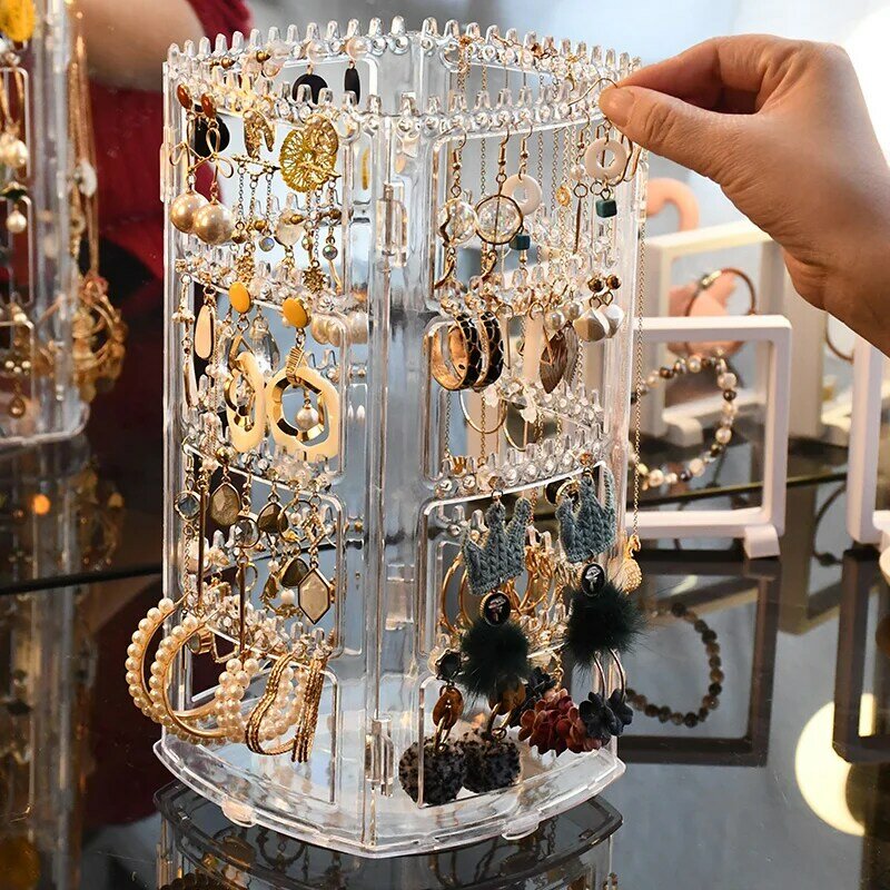 Scatola di immagazzinaggio del supporto del banco di mostra rotante dei gioielli da tavolino dell'organizzatore dello scaffale di esposizione della collana dei gioielli degli orecchini trasparenti di plastica