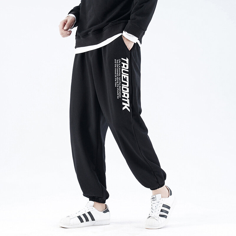 韓国男性スウェットパンツヒップホップカジュアルなズボン印刷文字ワイド脚ズボン2021春の秋男性スウェットパンツファッションパターン