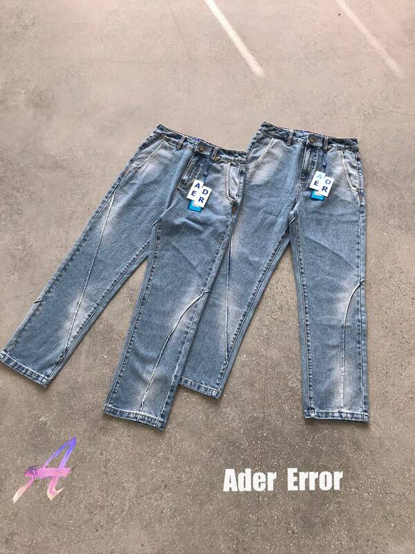 Adererror-男性と女性のための不規則なラップアラウンドエラー生地のふくらんでいるジーンズ