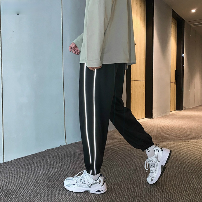 Calça casual listrada solta refletiva, calça ajustável com cintura elástica estilo coreano moda outono masculina na altura do tornozelo