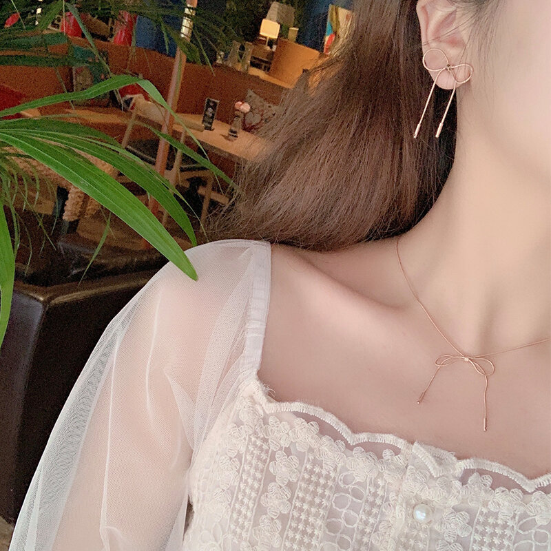 Temperamento in stile coreano collana e orecchini con fiocco in oro rosa Suite breve Internet orecchini a catena a clavicola calda temperamentale