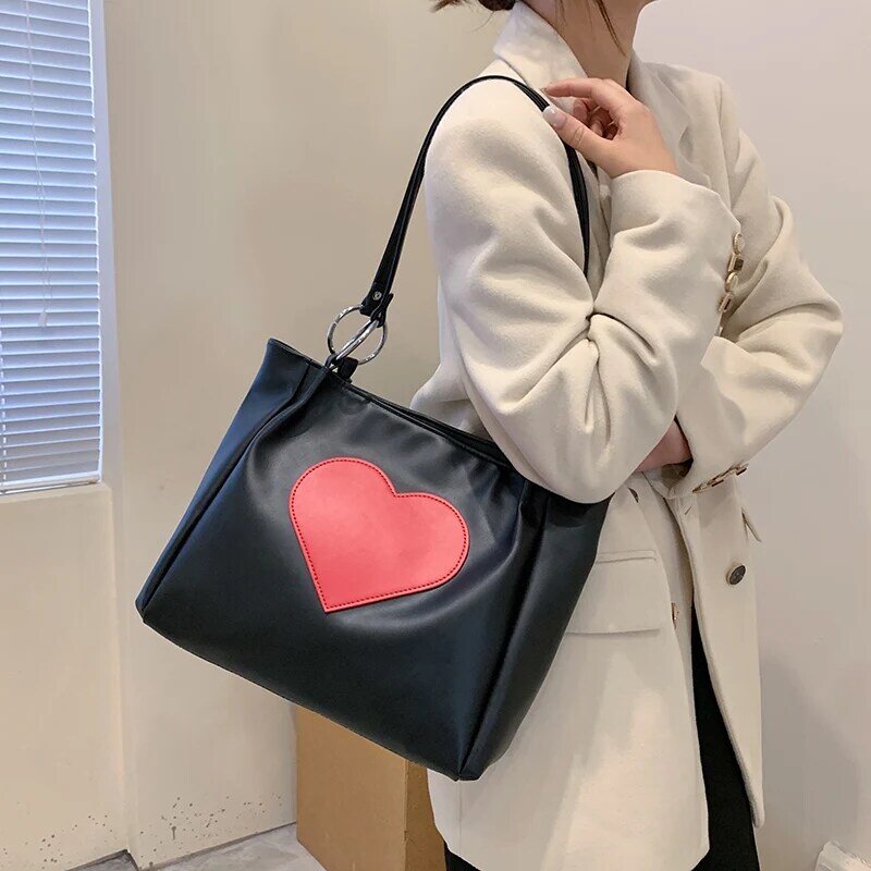 女性のためのデザイナーレザーハンドバッグ,大きな容量,ハート型,対照的な色,新しいコレクション2021