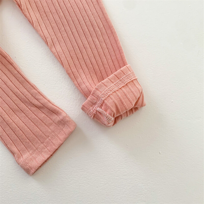 Pantaloni per bambini primaverili e autunnali per ragazzi e ragazze moda carino colore ricamo lettere Leggings elastici pantaloni per bambini Ropa Bebe nijos