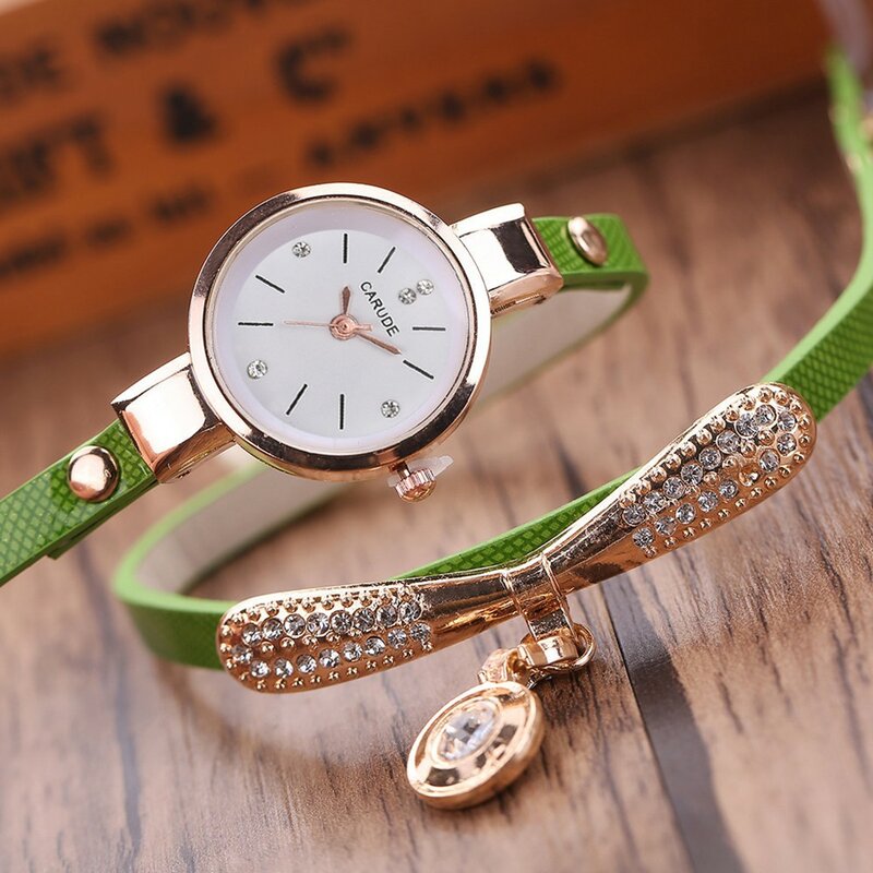 Reloj con correa de Metal para mujer, pulsera de cuarzo, a la moda, XQ