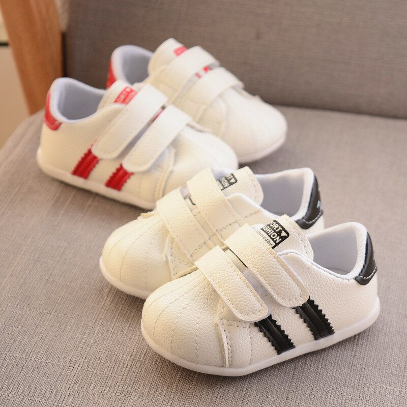 Zapatos deportivos de calzado de cuero de PU para bebé para niños y niñas, zapatillas de algodón suave de Color sólido, antideslizantes, novedad, gran oferta