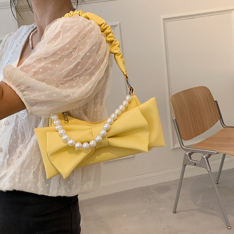 Nowe proste torebki damskie torebki Crossbody projektant perła łańcuszek łuk kobieca torba na ramię Sac miękka skórzana torba damska Bolsa