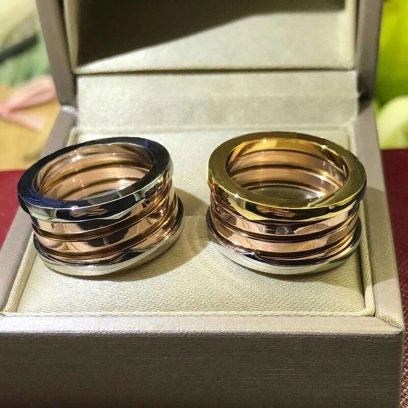 Mode charme-titanium ring mit frühling für männer und frauen, engagement party schmuck, klassische logo, original