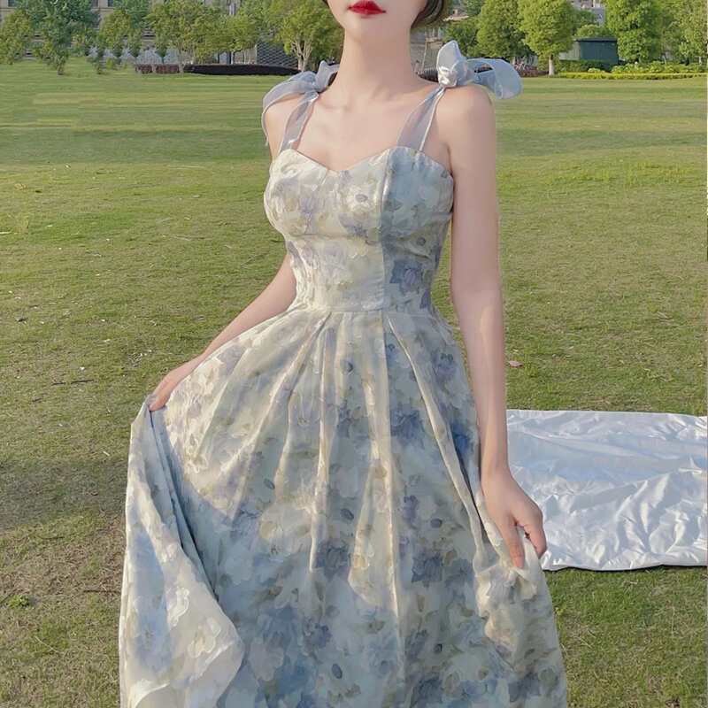 فستان جنية جديد الصيف الفرنسية خمر أنيقة السباغيتي حزام الأزهار طباعة فستان حفلة قطعة واحدة المرأة الكورية فستان أنيق