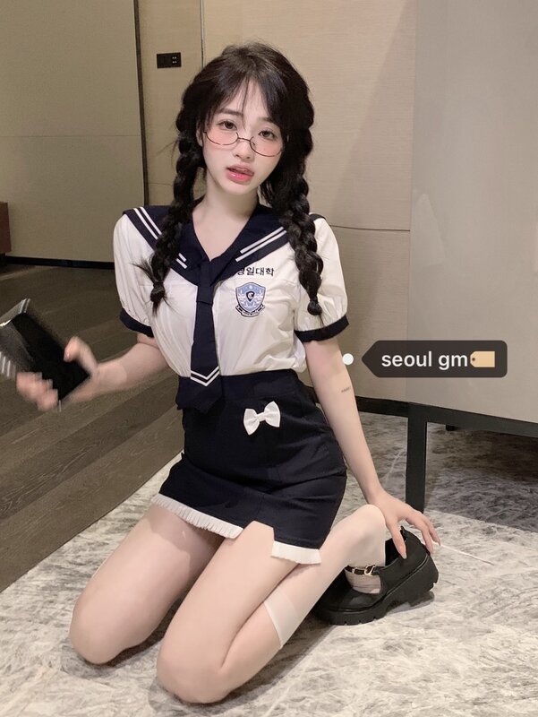女性の大学のスカートスーツ素敵な年齢を軽減するスカート韓国の制服制服ヒップラップスーツショートスカート
