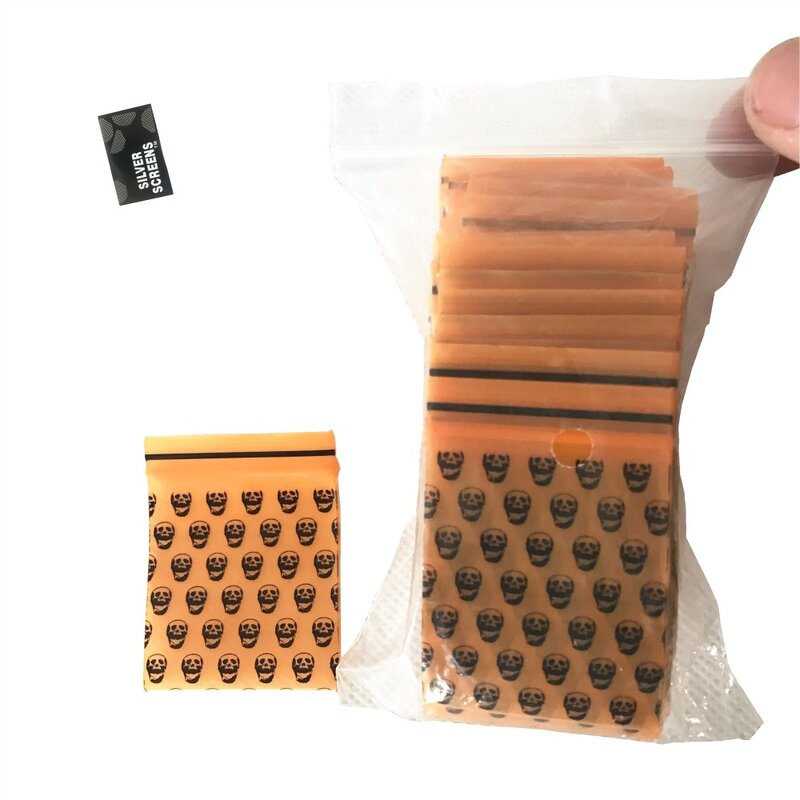 1 confezione (100 pezzi) nuova borsa per tabacco borsa sigillata per tabacco borsa per la conservazione del fumo modello teschio arancione con supporto borsa per tabacco 2020 nuovo