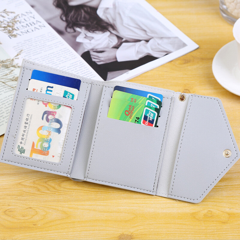 Nowe skórzane małe portfele damskie luksusowe marki Design Mini portfel torebki damskie krótkie monety Zipper etui na karty kredytowe
