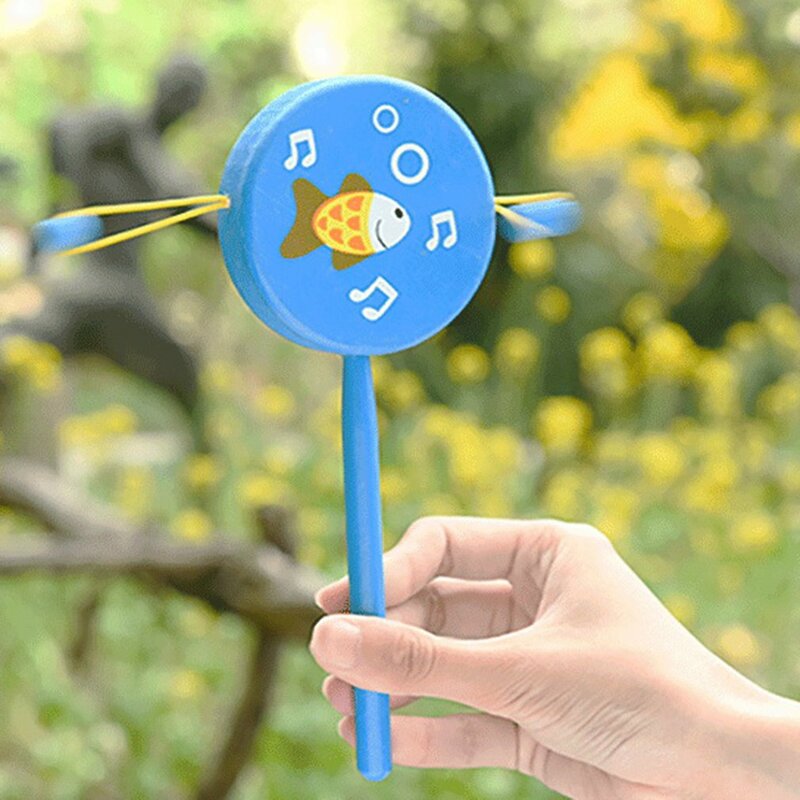 1pc chińskie tradycyjne drewniana grzechotka bęben Spin zabawki dla dziecka dzieci Cartoon uśmiech muzyczny dzwonek ręczny Instrument muzyczny dla dzieci zabawka