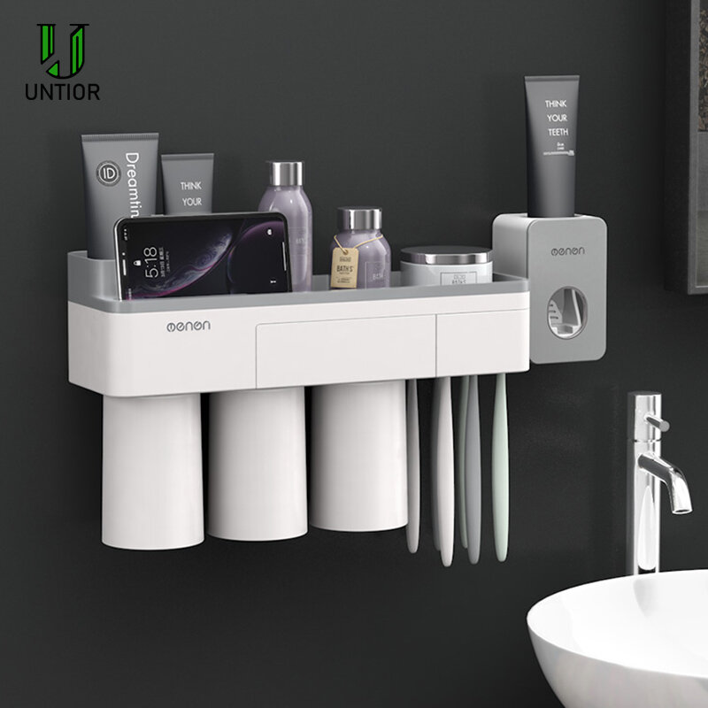 UNITORพลาสติกติดผนังผู้ถือแปรงสีฟันAutomatic Toothpaste Dispenserเก็บอุปกรณ์อาบน้ำห้องน้ำอุปกรณ์เสริมชุด