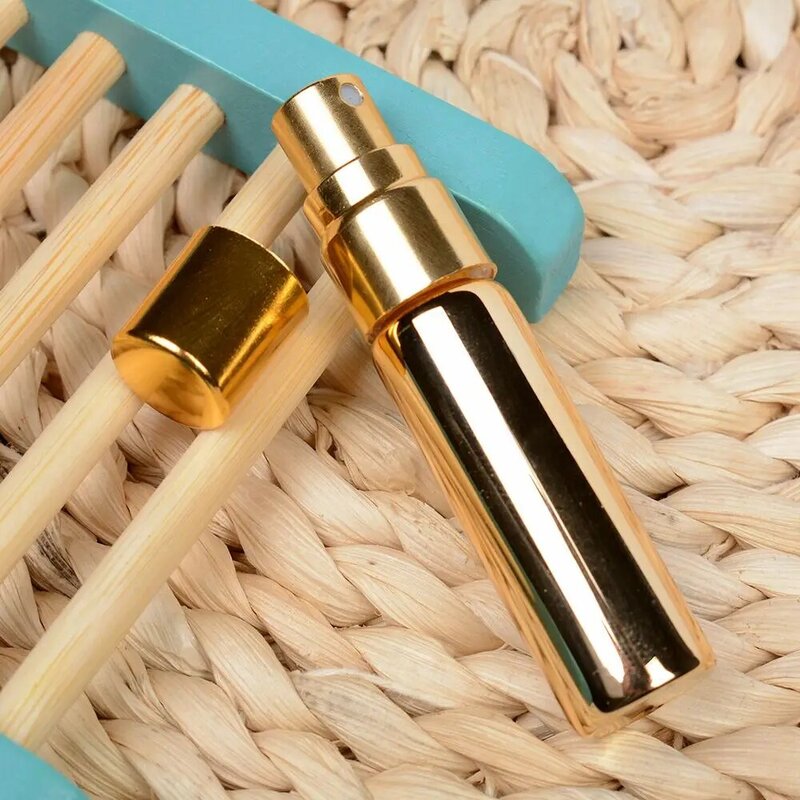 ISKYBOB-minibotella portátil de Metal para Perfume, accesorio de viaje con espray y estuche de Perfume vacío, 5ML, 1 unidad