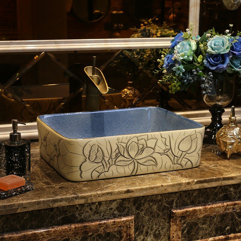 Lavabo de cerámica Rectangular sobre plataforma de Arte de loto esculpida por Jing Shun. Plataforma de lavabo para el hogar