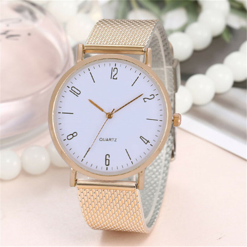 Neue Einfache Damen Quarzuhr Temperament Beiläufige Uhr Weibliche Modelle Klassische Kreative Quarz Armbanduhren relogio mujer Q521