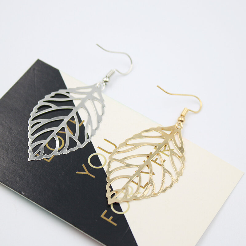Boucles d'oreilles pendantes en forme de feuilles de métal pour femme, Bijoux creux à la mode, nouvelle collection, vente en gros