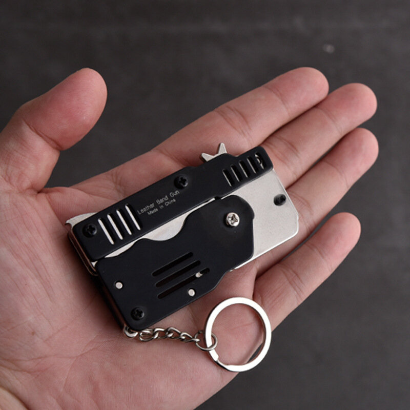Mini outils de plein air pliants pouvant contenir le porte-clés du pistolet à bande de caoutchouc Six rafales, pistolets tout en métal, jouet de tir, cadeaux pour garçons