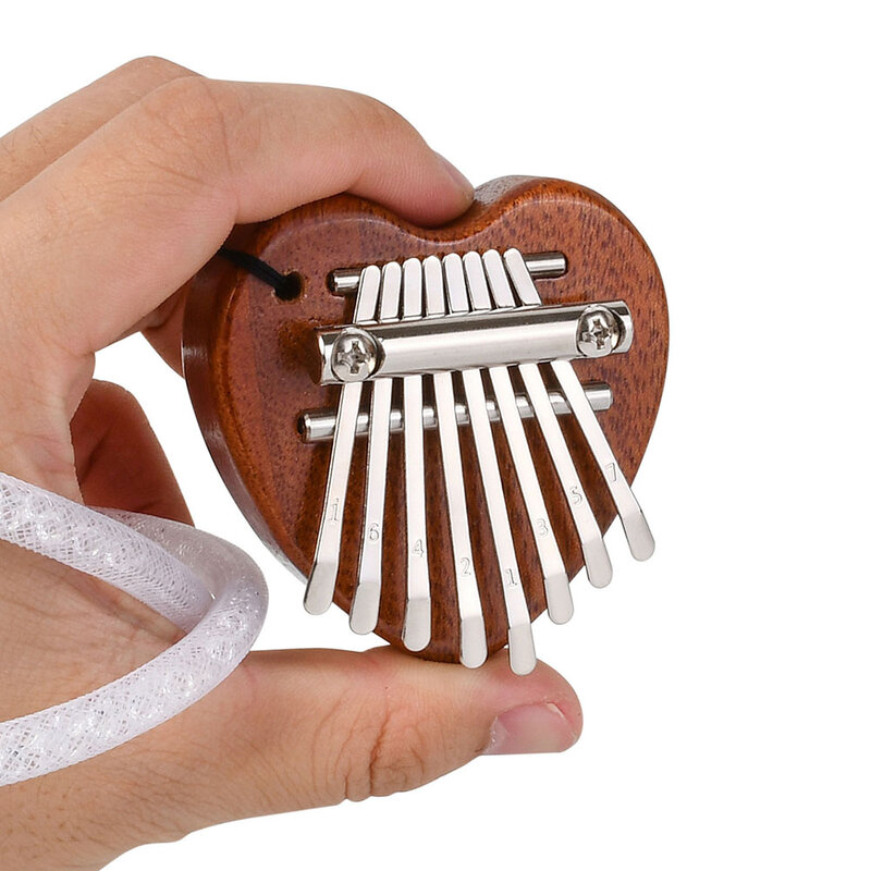 Mini portatile a 8 tasti Kalimba creativo a forma di cuore pollice pianoforte leggero Mbira Sanza dito pianoforte musica regali