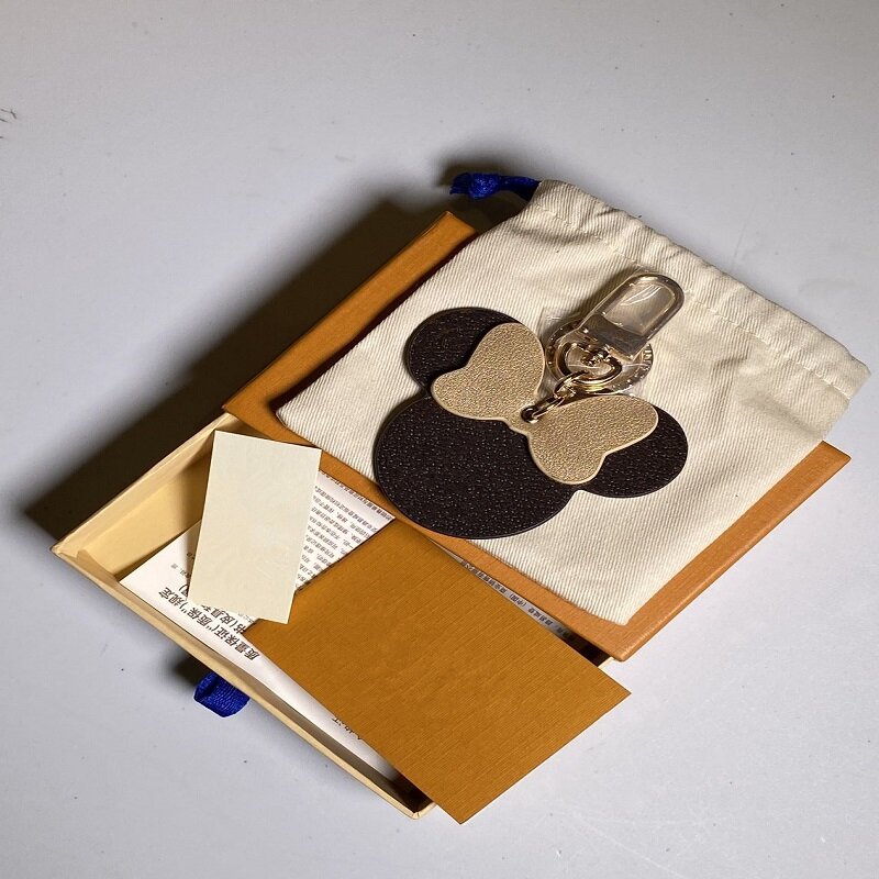 Luxury หนังสีน้ำตาล Presbyopia Mickey พวงกุญแจพวงกุญแจสำหรับกระเป๋าถือผู้หญิงกระเป๋าจี้ Key แหวนอุปกรณ์เสร...