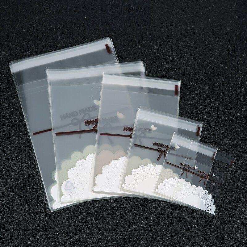 100 Uds. De bolsas de polietileno autoadhesivas transparentes, 7x7, 10x10, 12x16, 15x18, 16x20cm, lazo de encaje transparente, bolsa de plástico Opp para paquete de joyería
