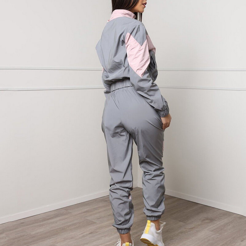 Feminino reflexivo esportes terno de duas cores costura de mangas compridas zíper de fitness elástico conjunto de duas peças feminino moda