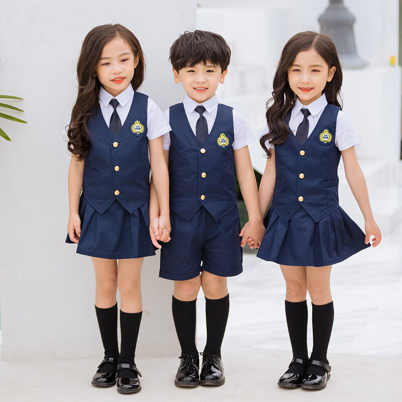 Uniformi scolastiche per studenti giapponesi in cotone blu Navy per bambini Set completo per ragazze ragazzi gilet gilet camicia gonna pantaloncini cravatta