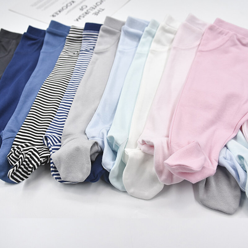 Noworodka spodnie bawełna wiosna jesień Unisex jednolita elastyczna talia Baby Boy spodnie niemowlę Footies niemowlęta dziewczęce spodnie nowość