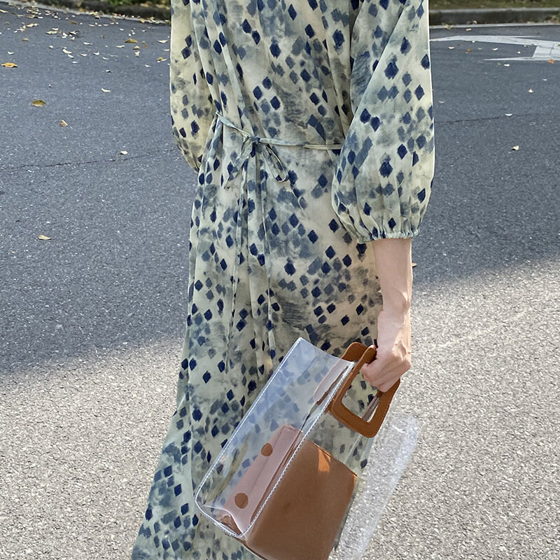 Ygブランド女性のvネックランタンスリーブ花柄のドレス夏2021ルースフランスハロー染料気質ミディアムの長さのスカート